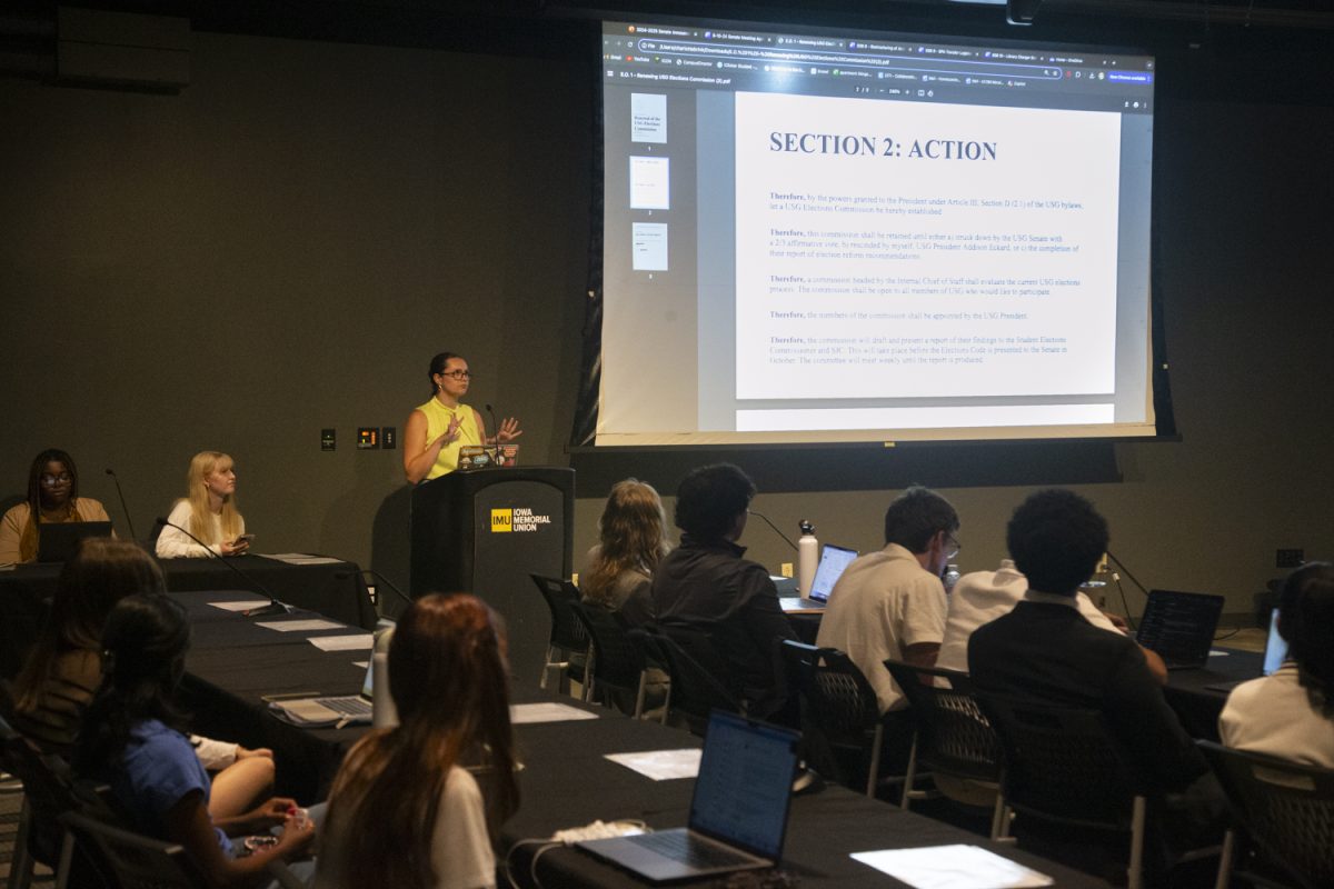 Members of the Undergraduate Student Government listen to Addison Eckerd speak during a meeting in the Iowa Memorial Union on Tuesday, Sept 10, 2024. USG approved a bill to continue to grow the textbook drive. 