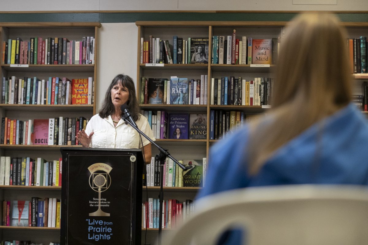 Author Maryann Lesert reads from her book “Land Marks” to an audience at Prairie Lights on Thursday, Sept. 12, 2024. “Land Marks” is a fiction novel based on Lesert’s real-life experience in observing and partaking in environmental activism in Michigan.