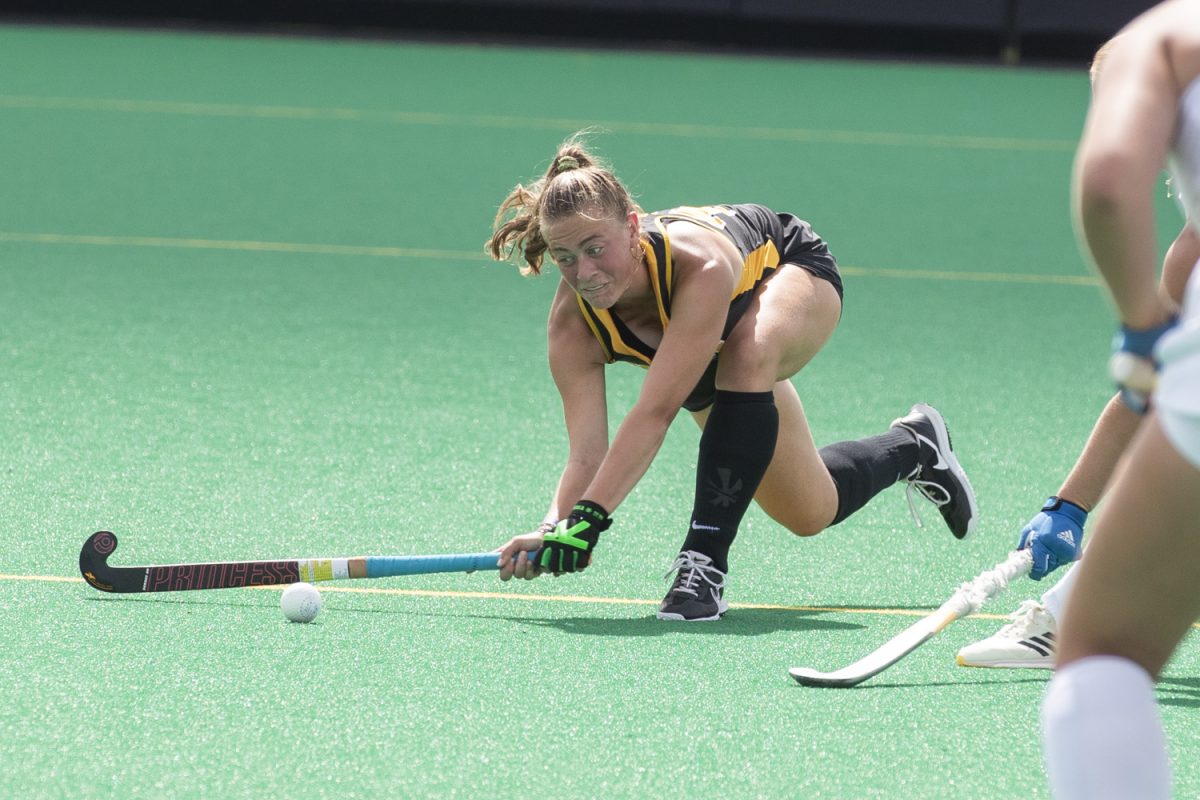 Iowa defender Fiene ten Seldam fires a pass during a field hockey match between Iowa and Delaware at Grant Field on Sunday, Sept. 15, 2024. The Hawkeyes defeated the Blue Hens, 1-0. 