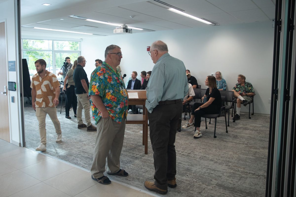 Community members and Johnson County Supervisors meet for the grand re-opening of the Johnson County Administration Building during a Board of Supervisors meeting on Wednesday Sept. 18, 2024. The members and attendees toured the renovated building. 