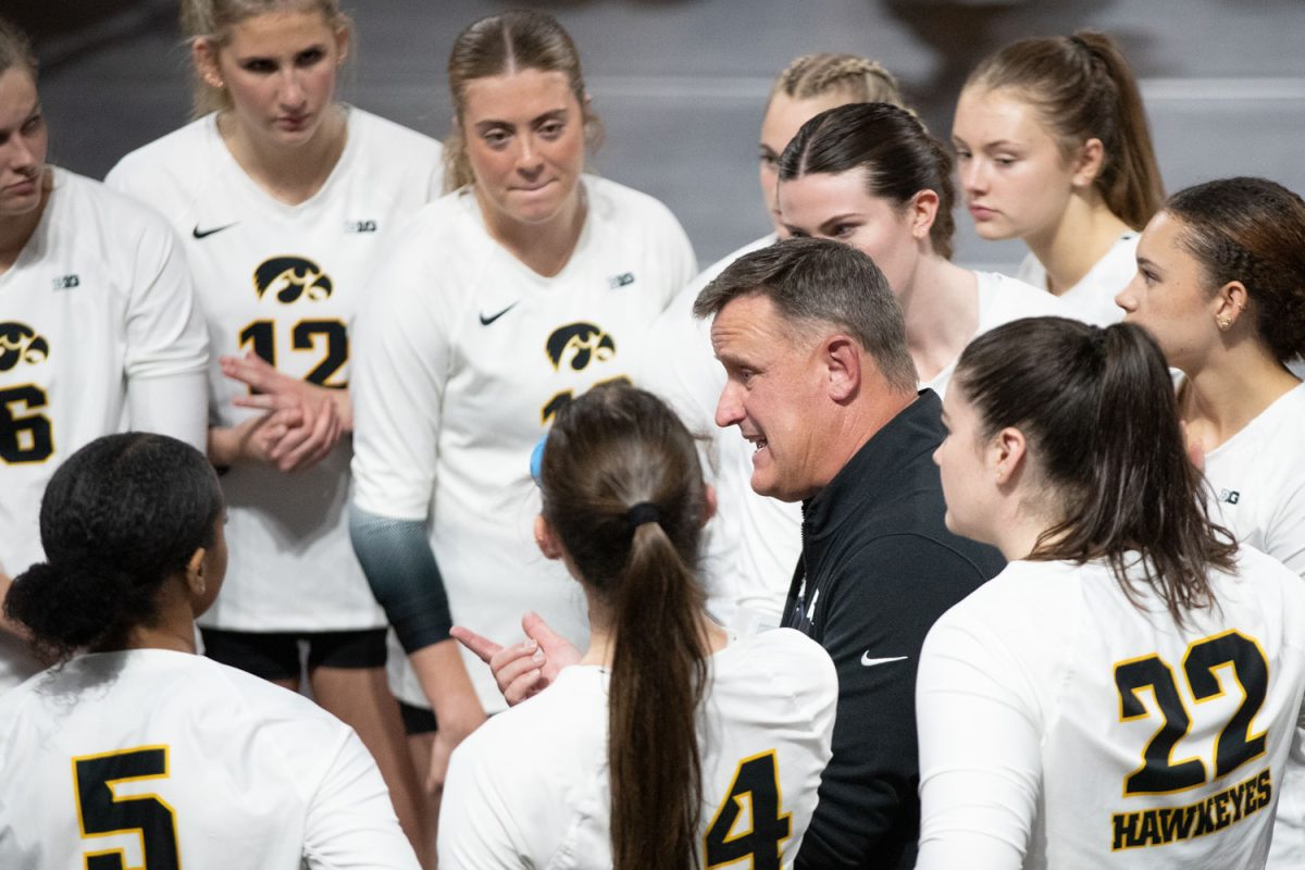 Head coach Jim Barnes rally his team during a volleyball match at Xtreme Arena in Coralville on Sept. 19. The Hawkeyes defeated the Coyotes 3-2. Jim Barnes is the Hawks 11th head coach in program history.