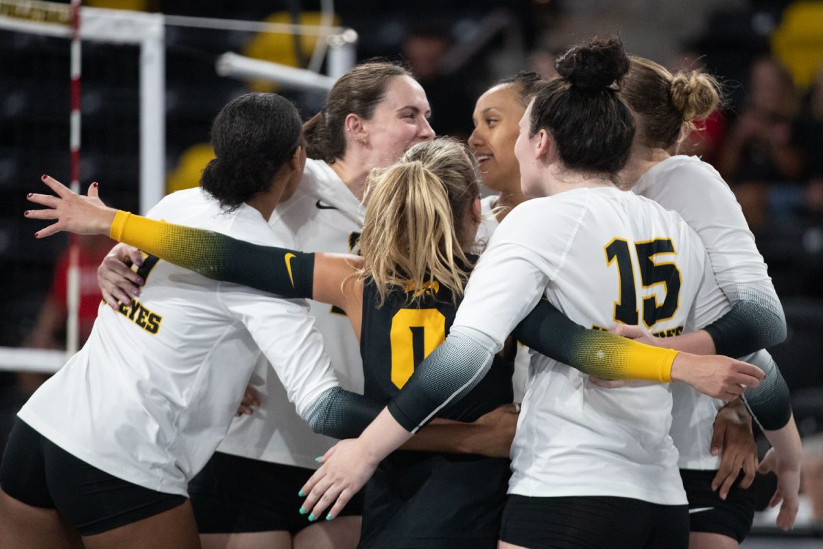 The Hawkeyes celebrate their 5th set win during a volleyball match at Xtreme Arena in Coralville on Thursday Sept. 19, 2024. The Hawkeyes defeated the Coyotes 3-2. The Hawkeyes have gone 6-4 so far this season.