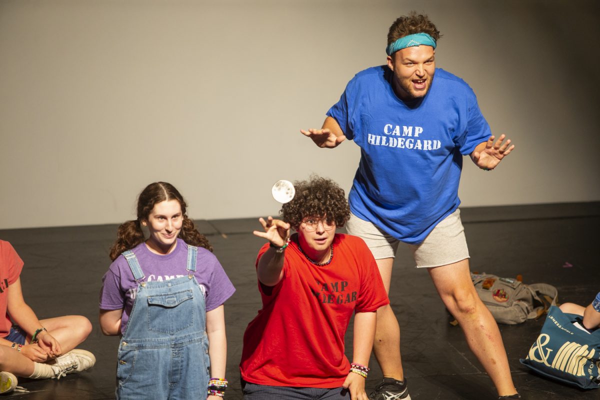 University of Iowa undergraduate and graduate theatre students play Catholic summer campers during a performance of THE (T)RE(X)FORMATION at the Alan MacVey Theatre inside the theatre building in Iowa City on Friday, Sept. 20, 2024. The play was written by MK Shultz and was shown Friday and Saturday.