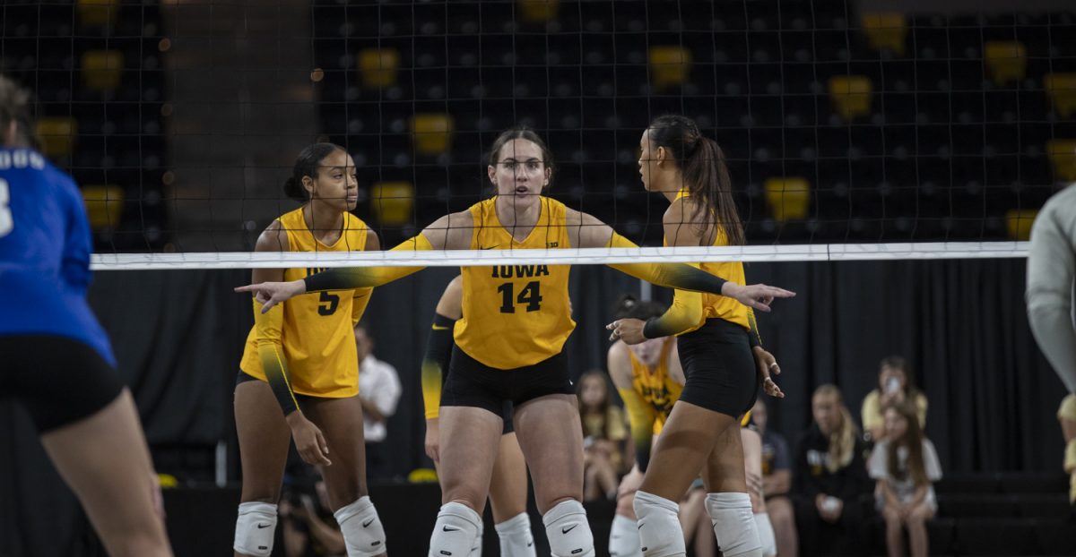 Iowa middle hitter Gracie Gibson signals to the Iowa defense during a volleyball game between the Iowa Hawkeyes and the Drake Bulldogs in the third and final game of the Kwik Star Klassic Tournament at Xtream Arena in Coralville Iowa on Saturday, Sept. 21,2024. The Bulldogs defeated the Hawkeyes 3-1. Gibson scored 13 points for the Hawkeyes.