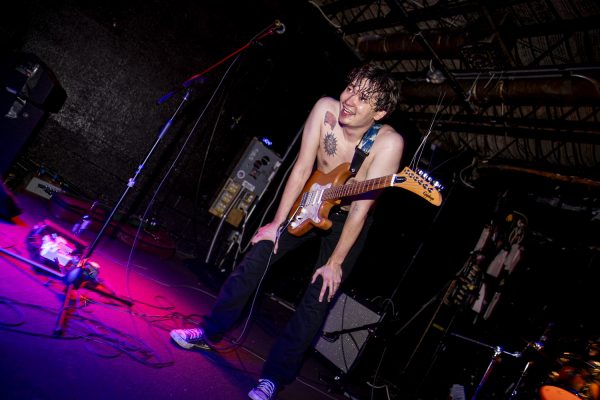 Fishbait guitarist Thomas Halligan looks at the crowd after performing at the Gabe’s 50th Anniversary Show in Iowa City on Saturday, Sept. 21, 2024. Fishbait formed in 2020 and released their first album in October of last year.