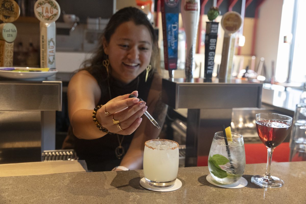 Reina Matsuura pours a Porch Water at Maggie’s Farm Wood-Fired Pizza on Sept. 21, 2024. Matsuura is the Catering and Beverage Manager of Maggie’s. Maggie's offers pizza, pasta, and other meals alongside their signature cocktails.