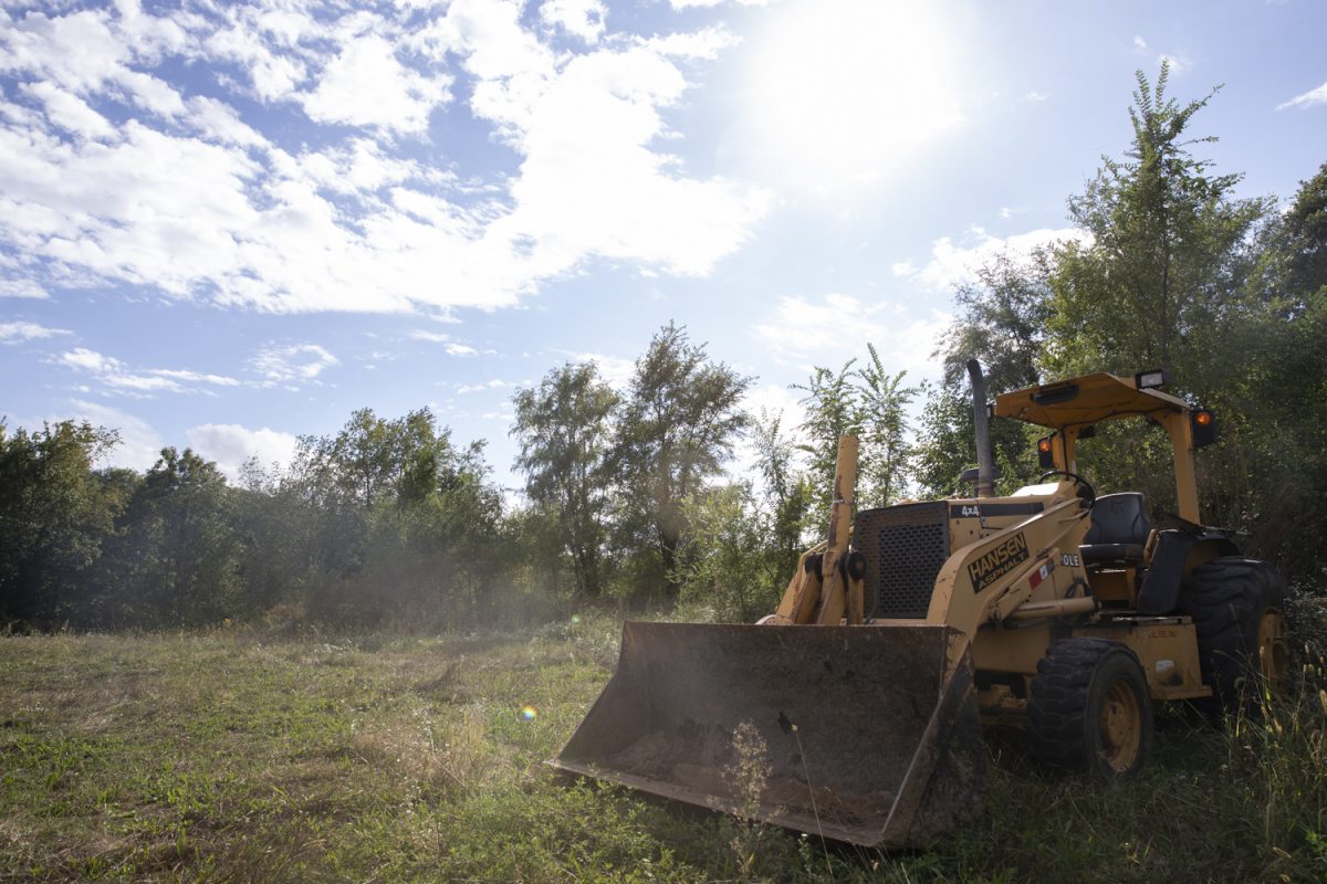 A backhoe is seen west of Tiffin off Highway Six on Monday, Sept. 23, 2024. This section of agricultural land is a part of the 56 acres, a part of the Johnson County Future Land Use Amendment.