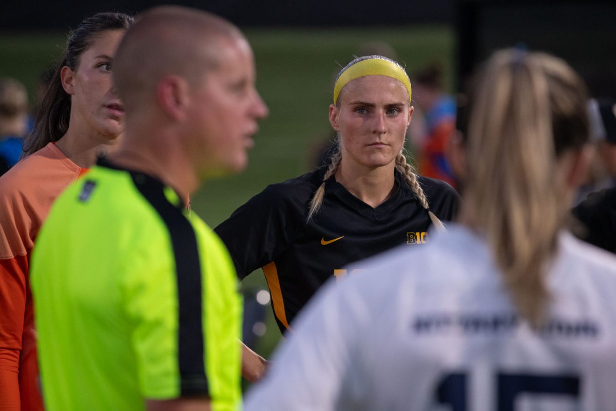 Defenseman Maggie Johnston listens to the head referee before an Iowa Soccer match on Thursday Sept, 26, 2024. The Hawkeyes defeated the Nittany Lions 2-1.