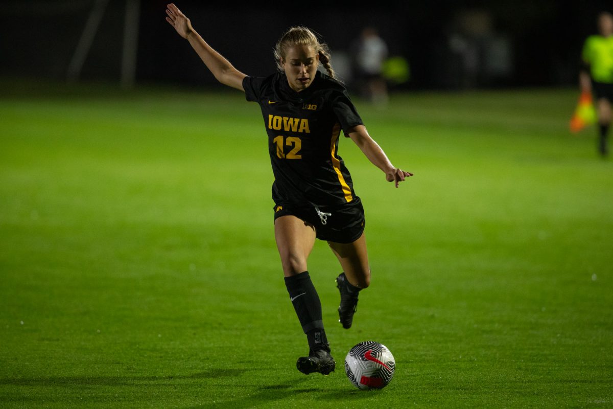 Forward Lauren Geczik crosses the ball during an Iowa Soccer match on Thursday Sept, 26, 2024. The Hawkeyes defeated the Nittany Lions 2-1.