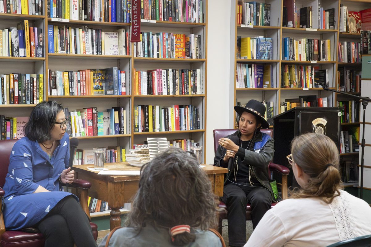 Iowa Writer Workshop graduate, m.s. RedCherries answers questions about her poetry collection, "mother," during a reading at Prairie Lights bookstore in Iowa City on Sept. 26. RedCherries explained the inspiration and creative process that went into writing her book.