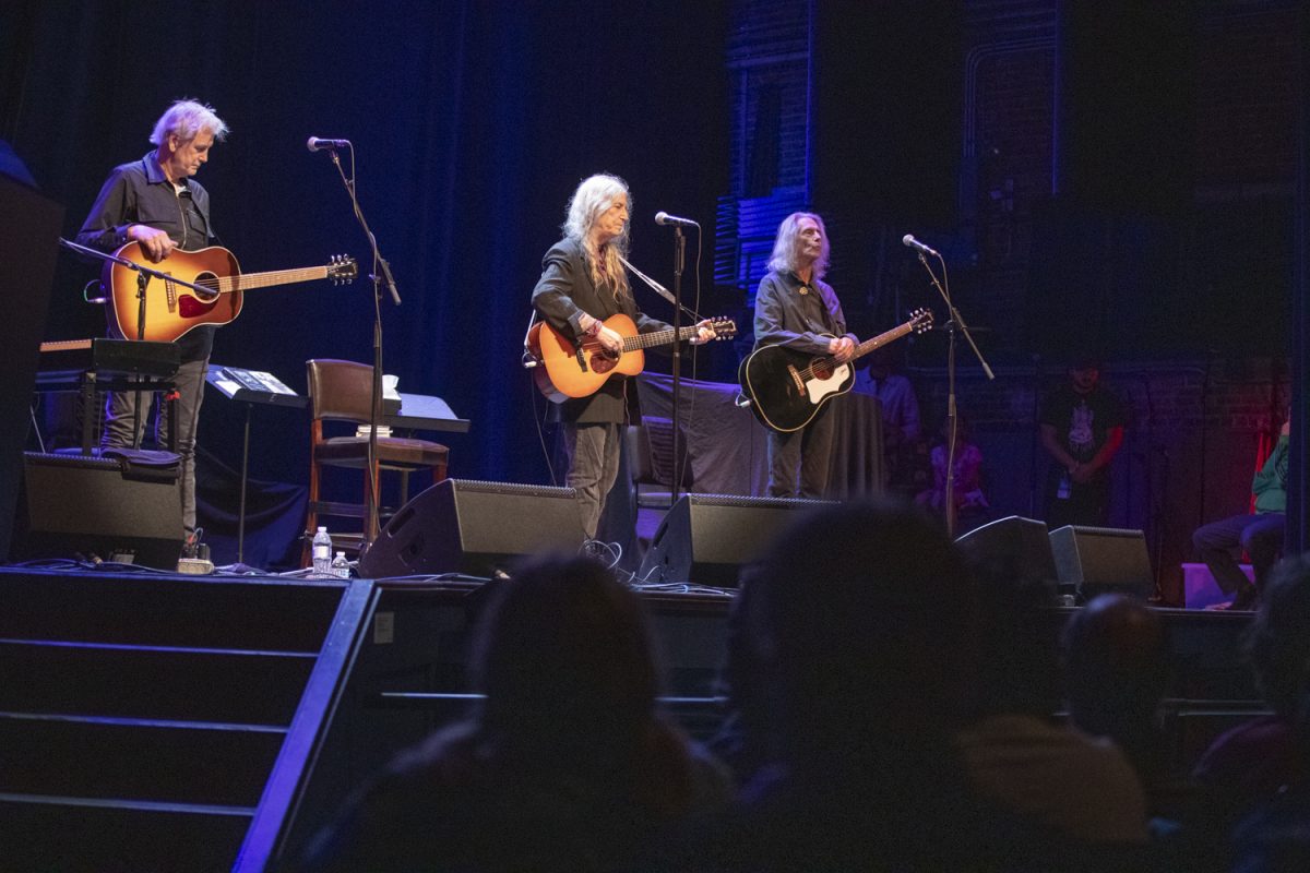 Patti Smith sings during a reading and performance at the Englert Theatre during the Infinite Dream Festival on Friday, Sept. 27, 2024. Smith is an author, singer-songwriter, and activist who sang with her band, played guitar, and read from her award-winning writing during her two shows.