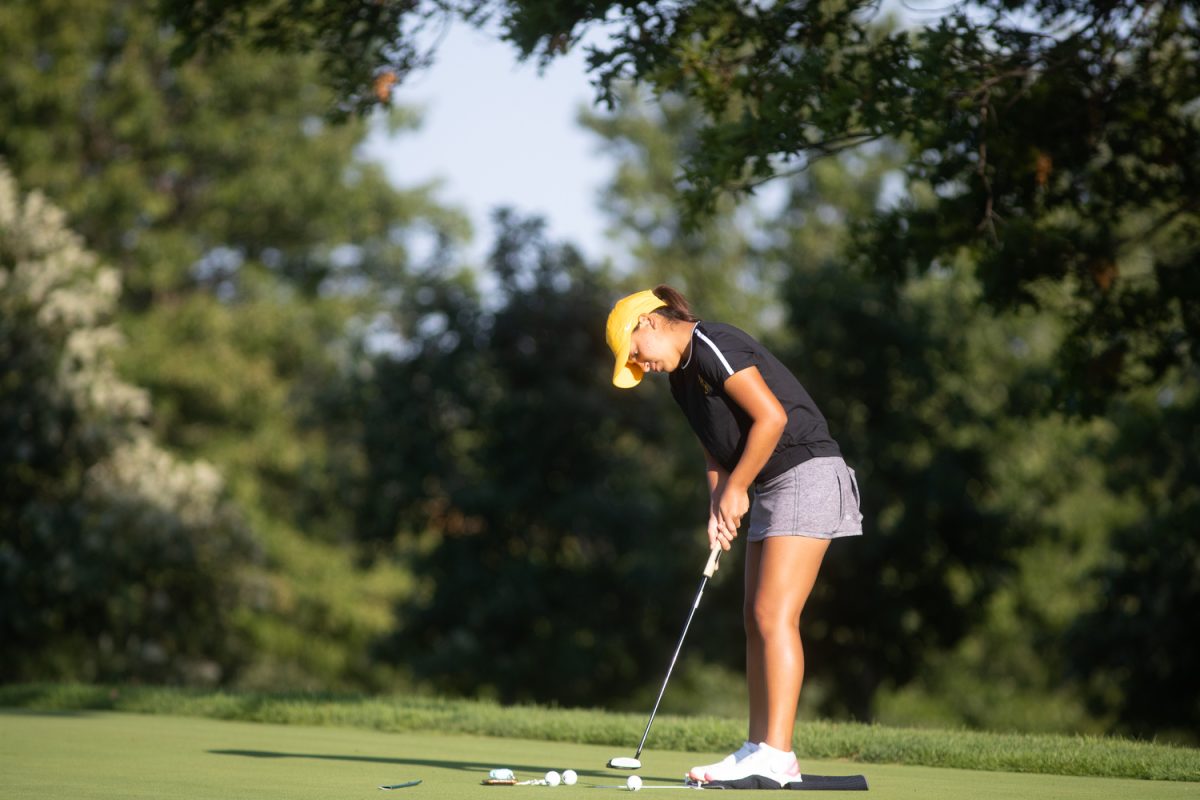 Paula Miranda practices her putt at Finkbine Golf Course on Thursday, Sept. 16, 2021. 