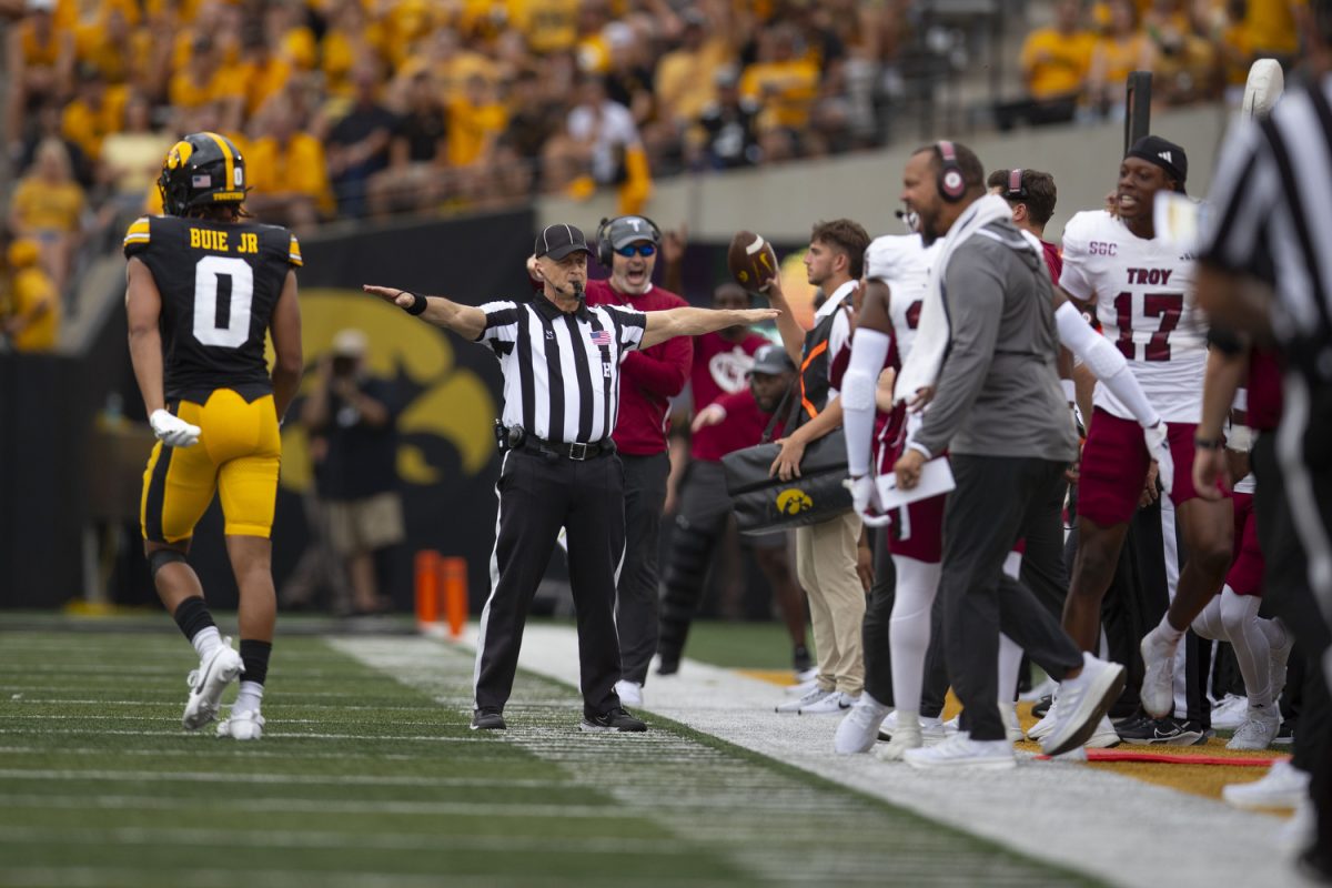 A referee calls an incomplete pass to Iowa wide receiver Jarriett Buie during a football game between Iowa and Troy at Kinnick Stadium on Saturday, Sept. 14, 2024. The Hawkeyes defeated the Trojans, 38-21. 
