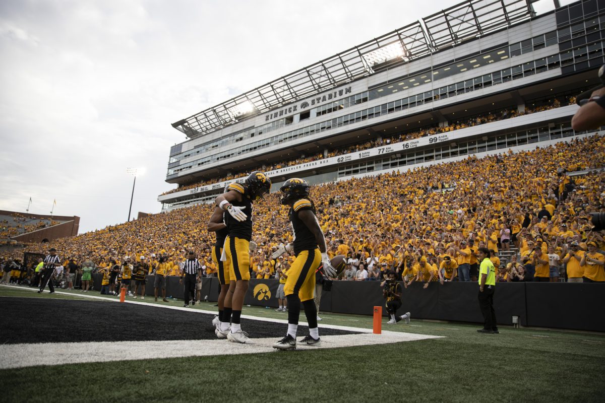 Iowa running back Jaziun Patterson celebrates a touchdown during a football game between Iowa and Troy at Kinnick Stadium on Saturday, Sept. 14, 2024. The Hawkeyes defeated the Trojans, 38-21. Patterson rushed 72 yards total. 