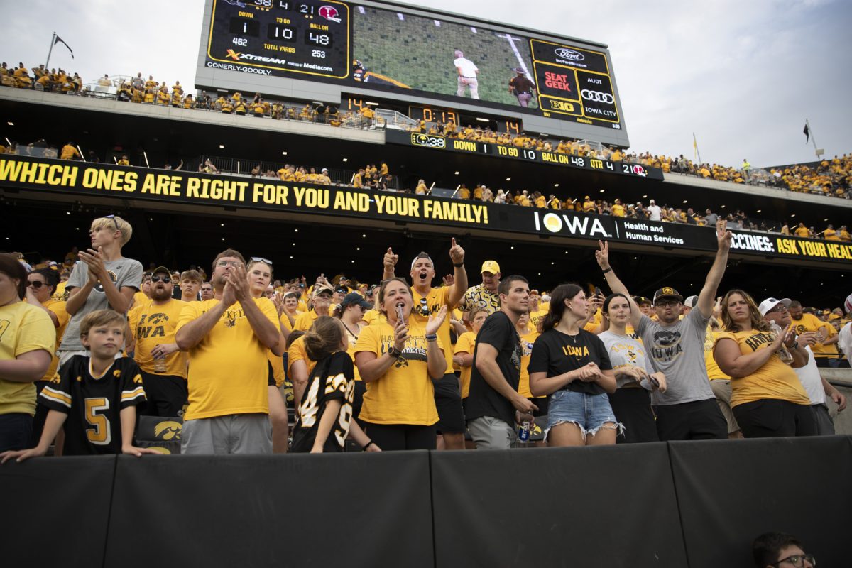 Iowa fans celebrate after a football game between Iowa and Troy at Kinnick Stadium on Saturday, Sept. 14, 2024. The Hawkeyes defeated the Trojans, 38-21. 