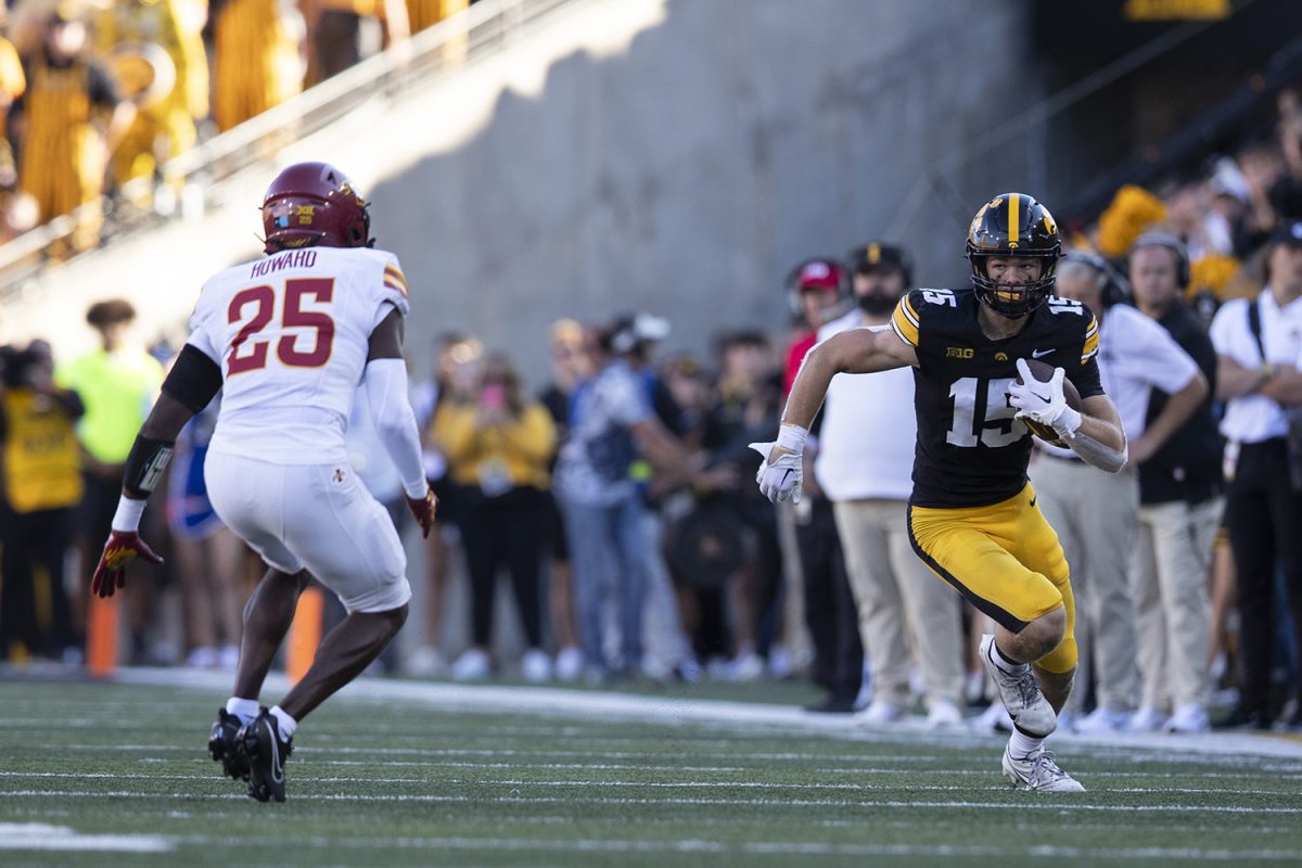 Iowa wide receiver Reece Vander Zee runs past Iowa State defense during a Cy-Hawk football game between No. 21 Iowa and Iowa State at Kinnick Stadium on Saturday, Sept. 7, 2024. The Hawkeyes lead the Cyclones, 13-0, after the first half. 