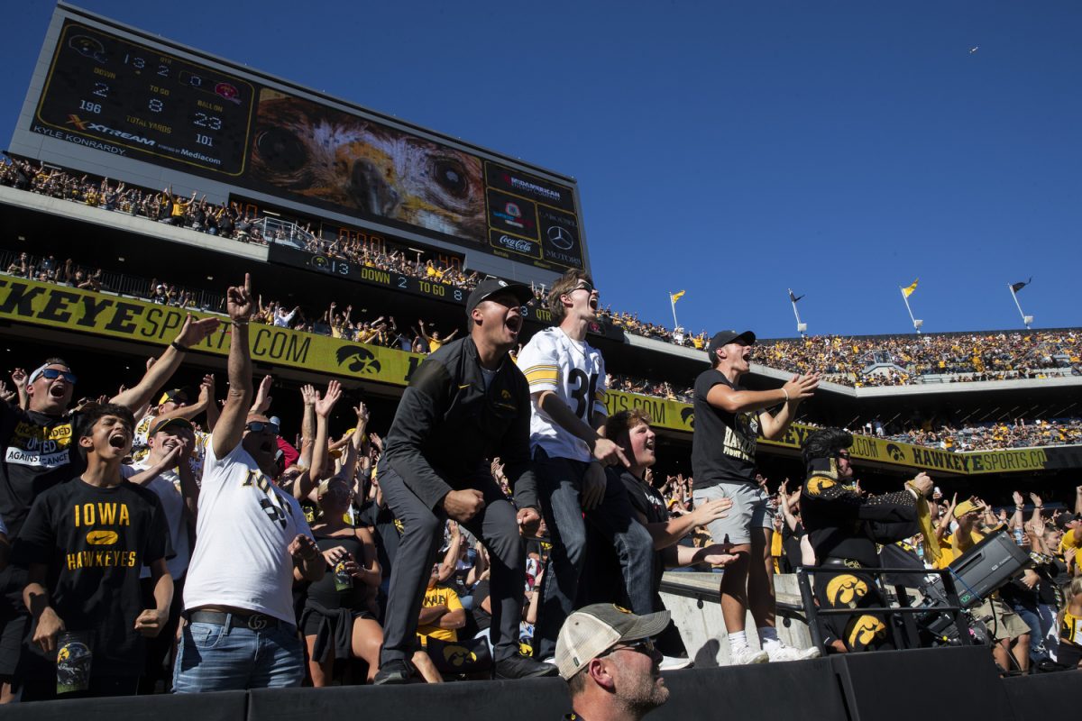 Fans react to a play by Iowa defense during a Cy-Hawk football game between No. 21 Iowa and Iowa State at Kinnick Stadium on Saturday, Sept. 7, 2024. The Cyclones defeated the Hawkeyes, 20-19.