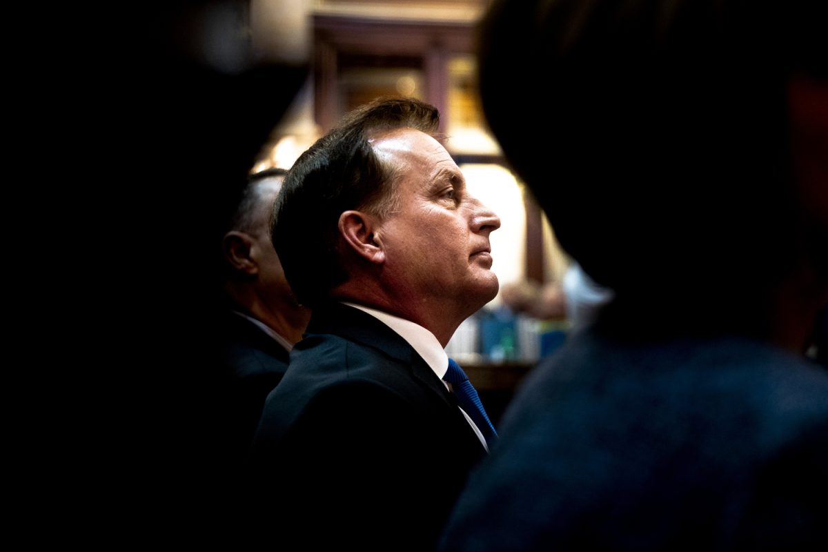 Secretary of State Paul Pate listens during the Condition of the State address at the Iowa State Capitol on Tuesday, Jan. 14, 2020. On Wednesday, the American Civil Liberties Union of Iowa filed a federal lawsuit against Pate.