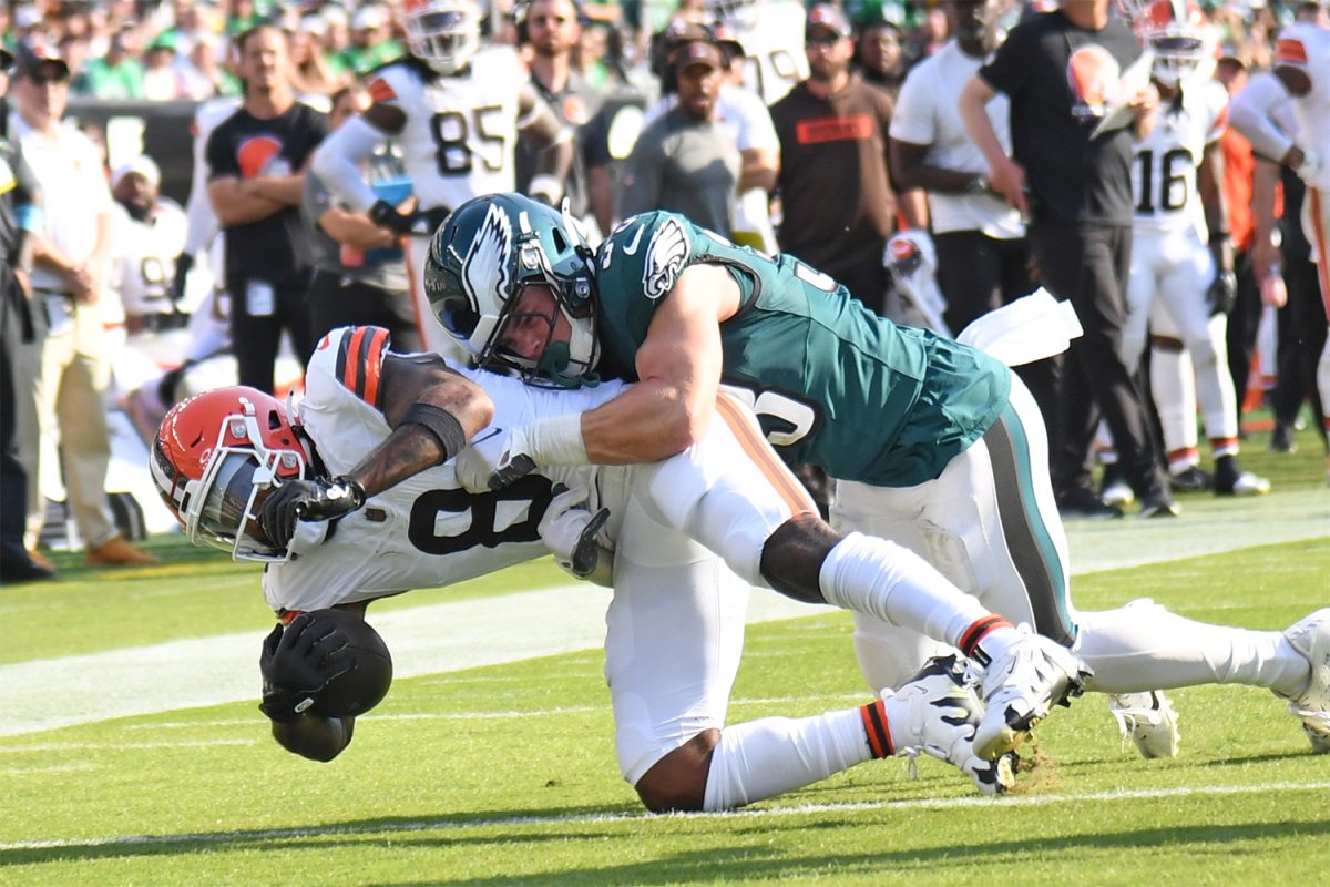 Oct 13, 2024; Philadelphia, Pennsylvania, USA; Cleveland Browns wide receiver Elijah Moore (8) is tackled by Philadelphia Eagles cornerback Cooper DeJean (33) during the fourth quarter at Lincoln Financial Field. 