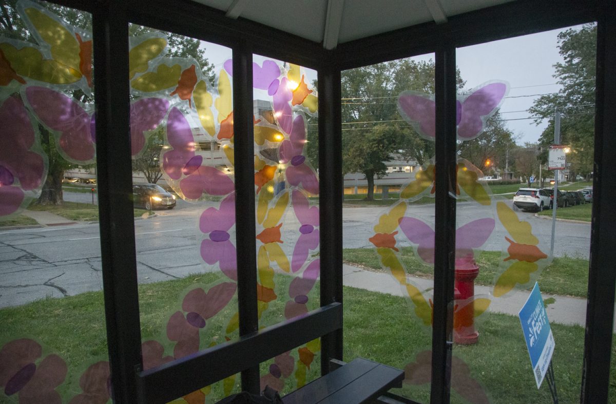 A painted bus transit stop as seen on Van Buren street and Jefferson street on Sept. 9. It is one of four newly-decorated bus stops across Iowa City.