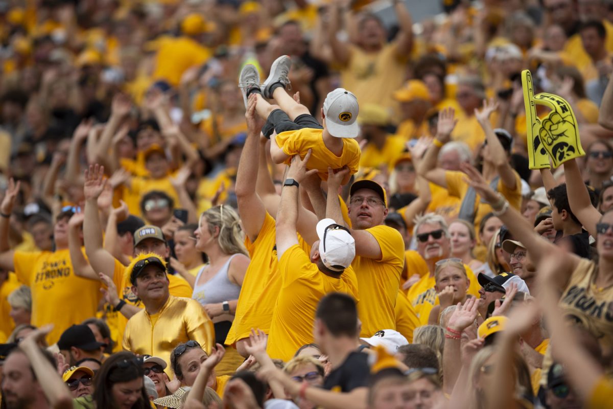 Fans do the "burrito lift" during a football game between Iowa and Troy at Kinnick Stadium on Sept. 14, 2024. The Hawkeyes defeated the Trojans, 38-21. 