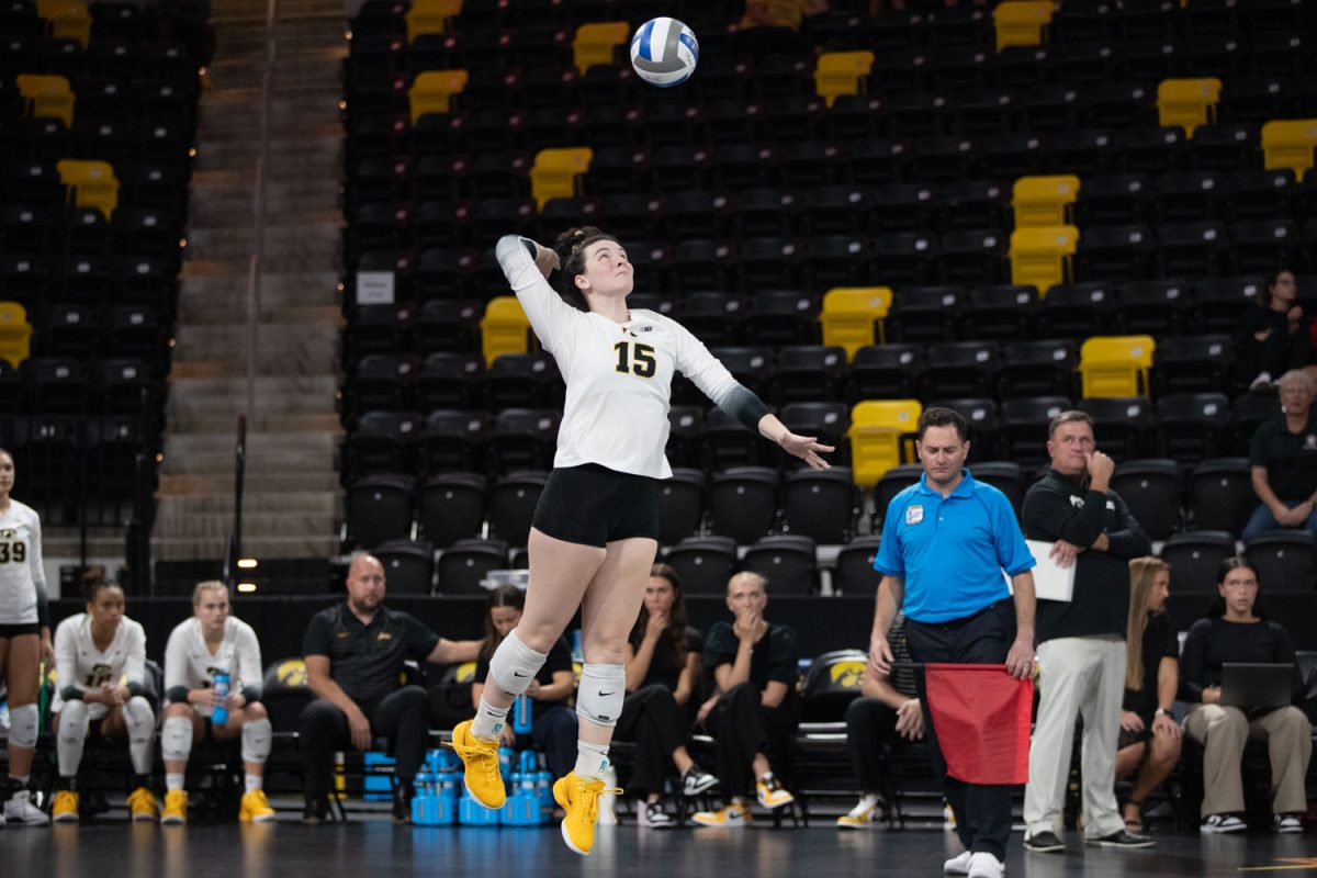 Michelle Urquhart serves the ball during a volleyball match between Iowa and South Dakota at Xtreme Arena in Coralville on Thursday Sept. 19, 2024. The Hawkeyes defeated the Coyotes 3-2. Michelle had 13 digs in the five set game.