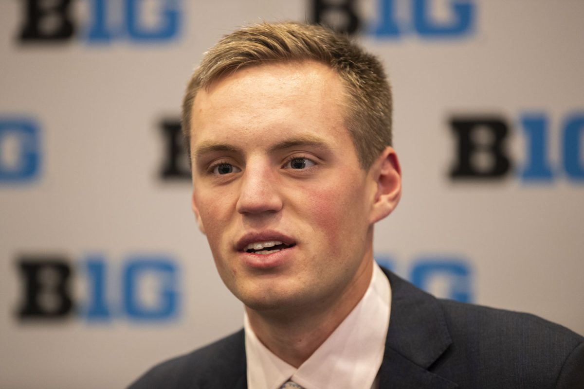 Iowa forward Payton Sandfort answers a reporter’s question during breakout podium interviews at the Big Ten Men’s Basketball Media Days in the Donald E. Stephens Convention Center in Rosemont, Illinois on Oct. 3. Podium interviews alternated between the coaches and two players from each team, lasting throughout the afternoon.