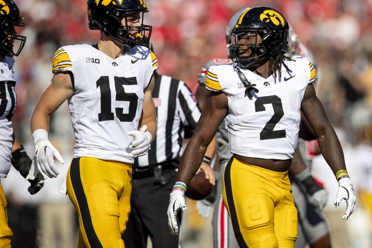 Iowa running back Kaleb Johnson interacts with other players following his carry during a football game between No. 3 Ohio State and Iowa at Ohio stadium in Columbus on Saturday, Oct. 4, 2024. The Buckeyes lead the Hawkeyes, 7-0. 