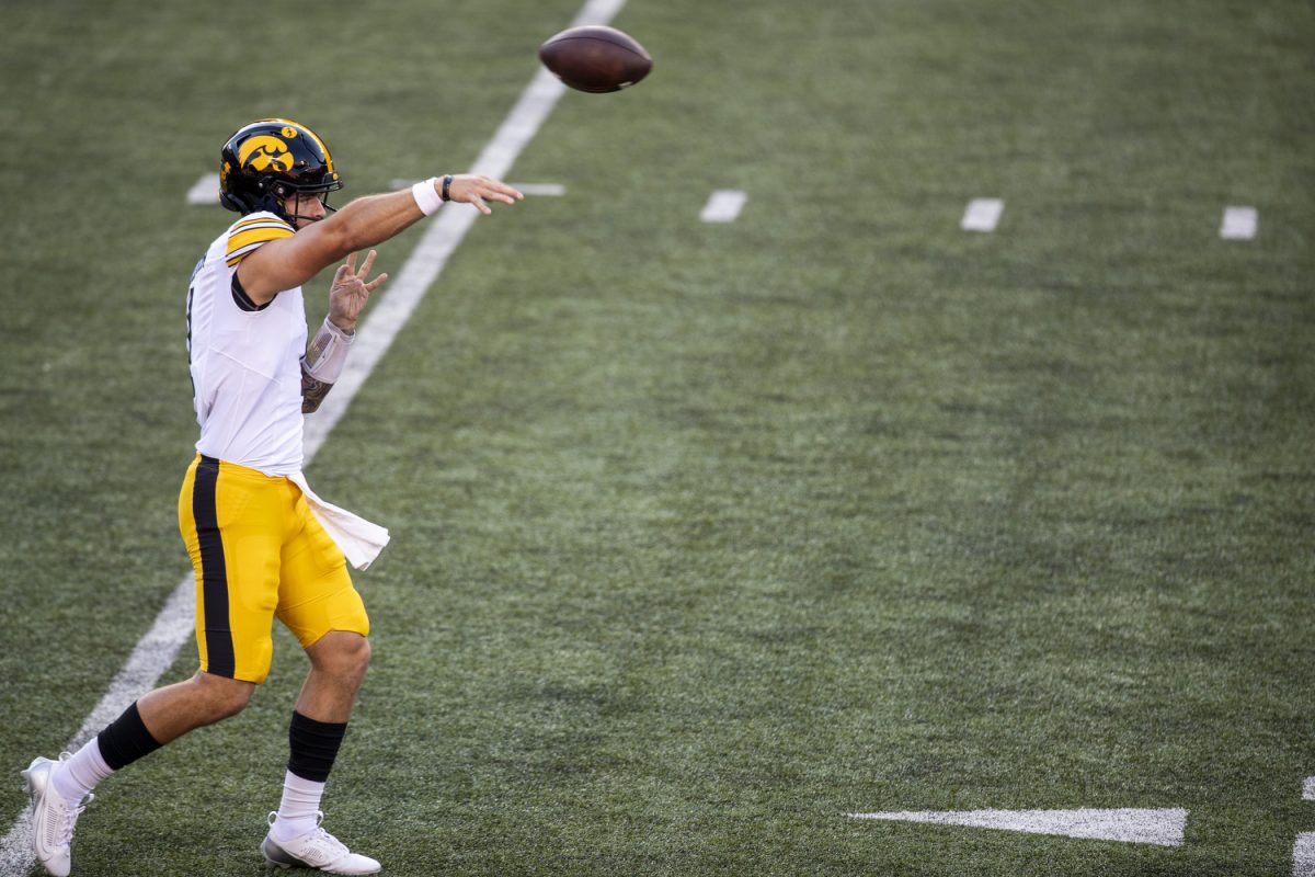 Iowa quarterback Brendan Sullivan warms up during a football game between No. 3 Ohio State and Iowa at Ohio Stadium in Columbus on Saturday, Oct. 4, 2024. Sullivan threw one pass for 12 yards. The Buckeyes defeated the Hawkeyes 35-7. 