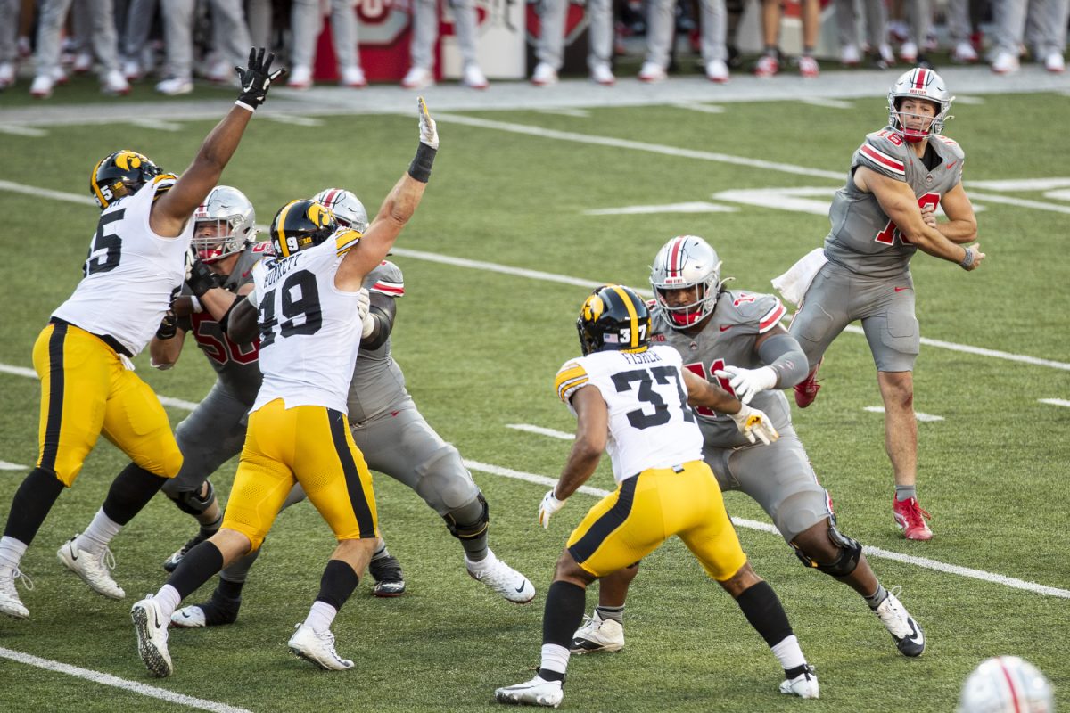 Ohio State quarterback Will Howard throws the ball during a football game between No. 3 Ohio State and Iowa at Ohio stadium in Columbus on Saturday, Oct. 4, 2024. The Buckeyes defeated the Hawkeyes 35-7.