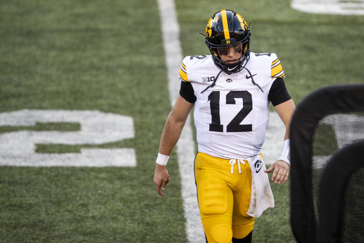 Iowa quarterback Cade McNamara walks off the field after fumbling the ball during a football game between No. 3 Ohio State and Iowa at Ohio Stadium in Columbus on Saturday, Oct. 4, 2024. Cade McNamara passed for 98 yards and had 14 completions. The Buckeyes defeated the Hawkeyes 35-7.