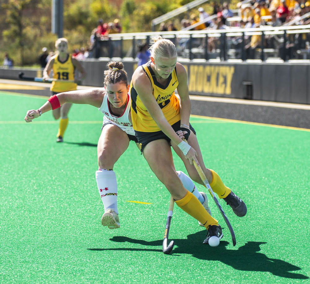 Iowa midfielder Dionne van Aalsum moves the ball down the field during a field hockey game between No. 10 Iowa and No. 5 Maryland at Grant Field in Iowa City on Sunday, Oct. 6, 2024. The Terrapins defeated the Hawkeyes 5-0.