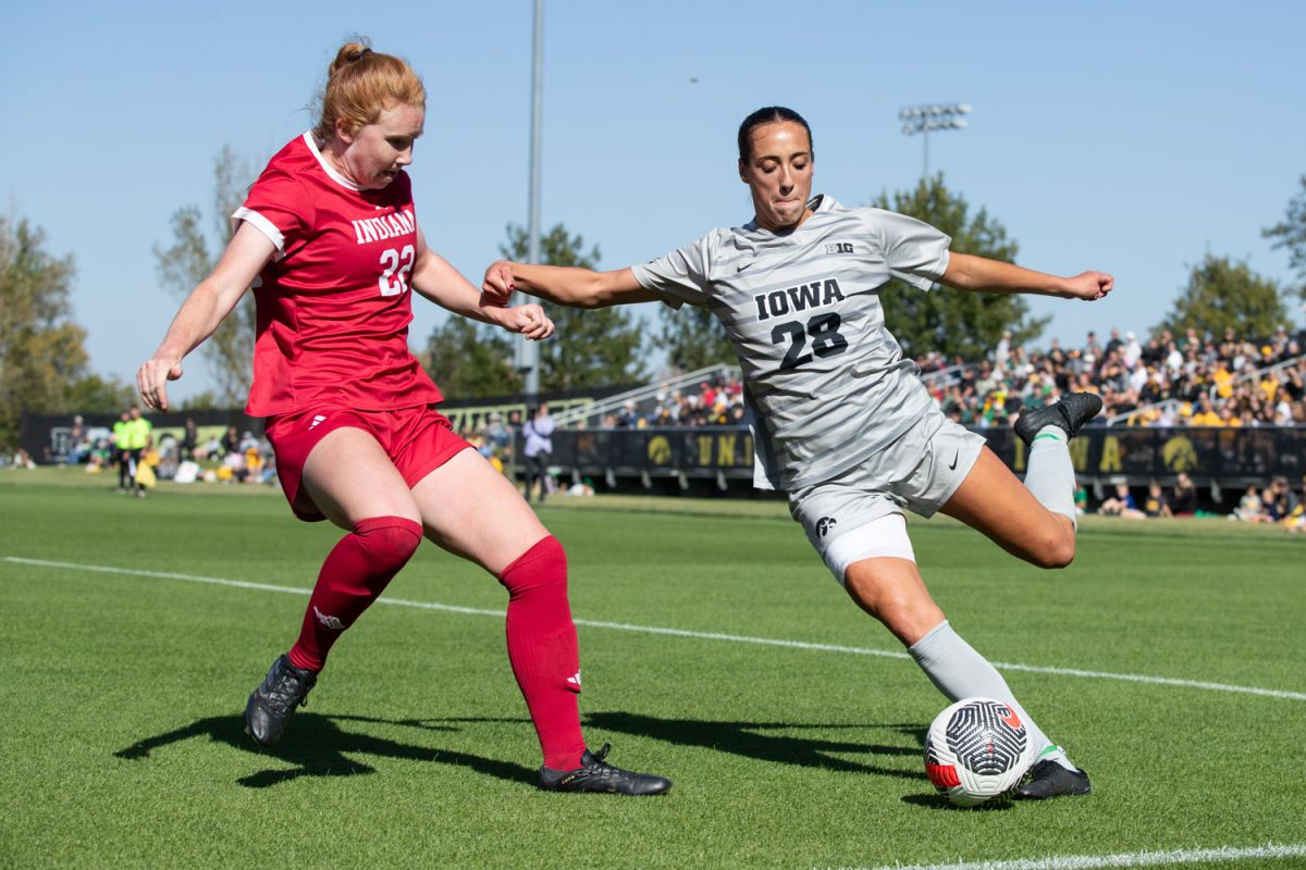 Iowa Midfielder Kenzie Roling crosses the ball towards the net during an Iowa Soccer match at the University of Iowa Soccer Complex on Oct. 6 in Iowa City. The Hawkeyes defeated the Hoosiers 1-0.