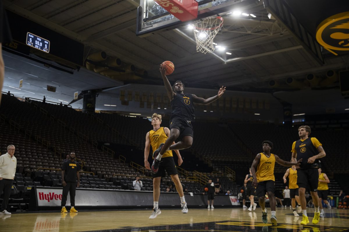 Iowa forward Seymour Traore shoots the ball during men’s basketball media day at Carver-Hawkeye Arena in Iowa City on Monday, Oct. 7, 2024. The team took interviews from the media and held an open practice.