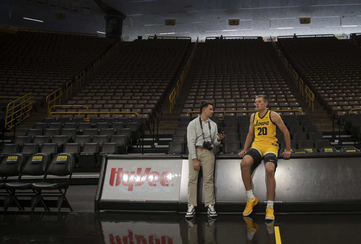 Iowa forward Payton Sandfort speaks with a member of the media during men’s basketball media day at Carver-Hawkeye Arena in Iowa City on Monday, Oct. 7, 2024. The team took interviews from the media and held an open practice.