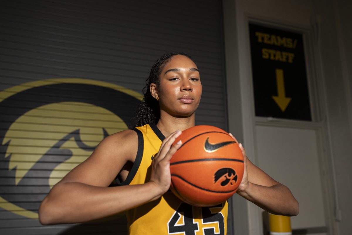 Iowa forward Hannah Stuelke poses for a portrait during Iowa women’s basketball media day at Carver-Hawkeye Arena in Iowa City on Thursday, Oct. 10, 2024. The players took photos and answered questions from the media.