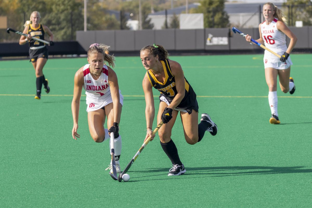 Iowa midfielder Sabrina McGroarty (1) runs with the ball during a field hockey game between No. 12 Iowa and Indiana at Grant Field in Iowa City on Friday, Oct. 11, 2024. The Hoosiers defeated the Hawkeyes 2-1 in double overtime.