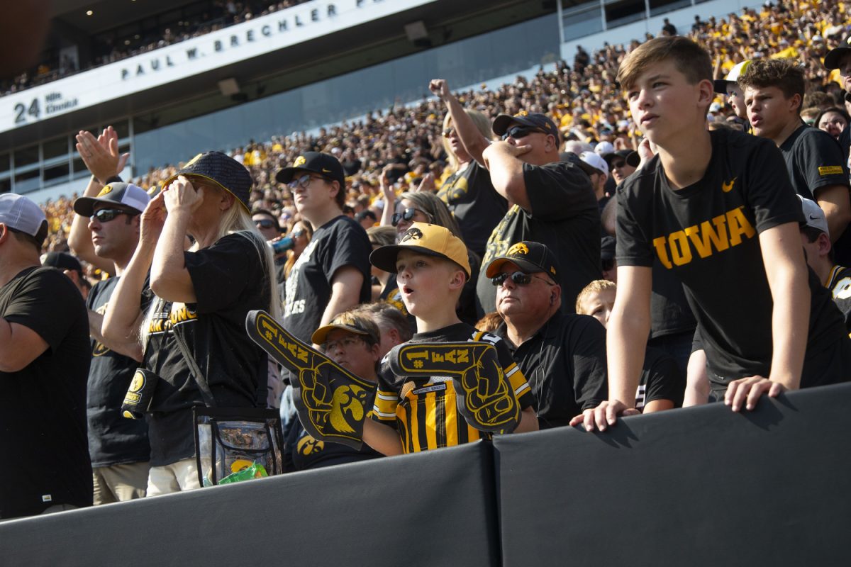 Hawkeye fans react to a call during a football game between Washington and Iowa at Kinnick Stadium in Iowa City on Saturday, Oct. 12, 2024. The Hawkeyes defeated the Huskies 40-16. (Emma Calabro/The Daily Iowan)