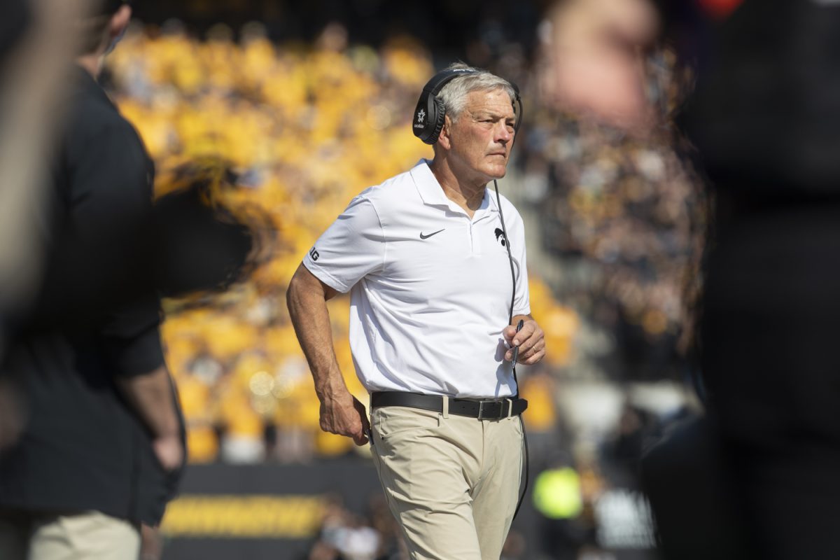 Iowa head coach Kirk Ferentz walks along the sidelines during a football game between Washington and Iowa at Kinnick Stadium in Iowa City on Saturday, Oct. 12, 2024. The Hawkeyes defeated the Huskies 40-16. (Emma Calabro/The Daily Iowan)