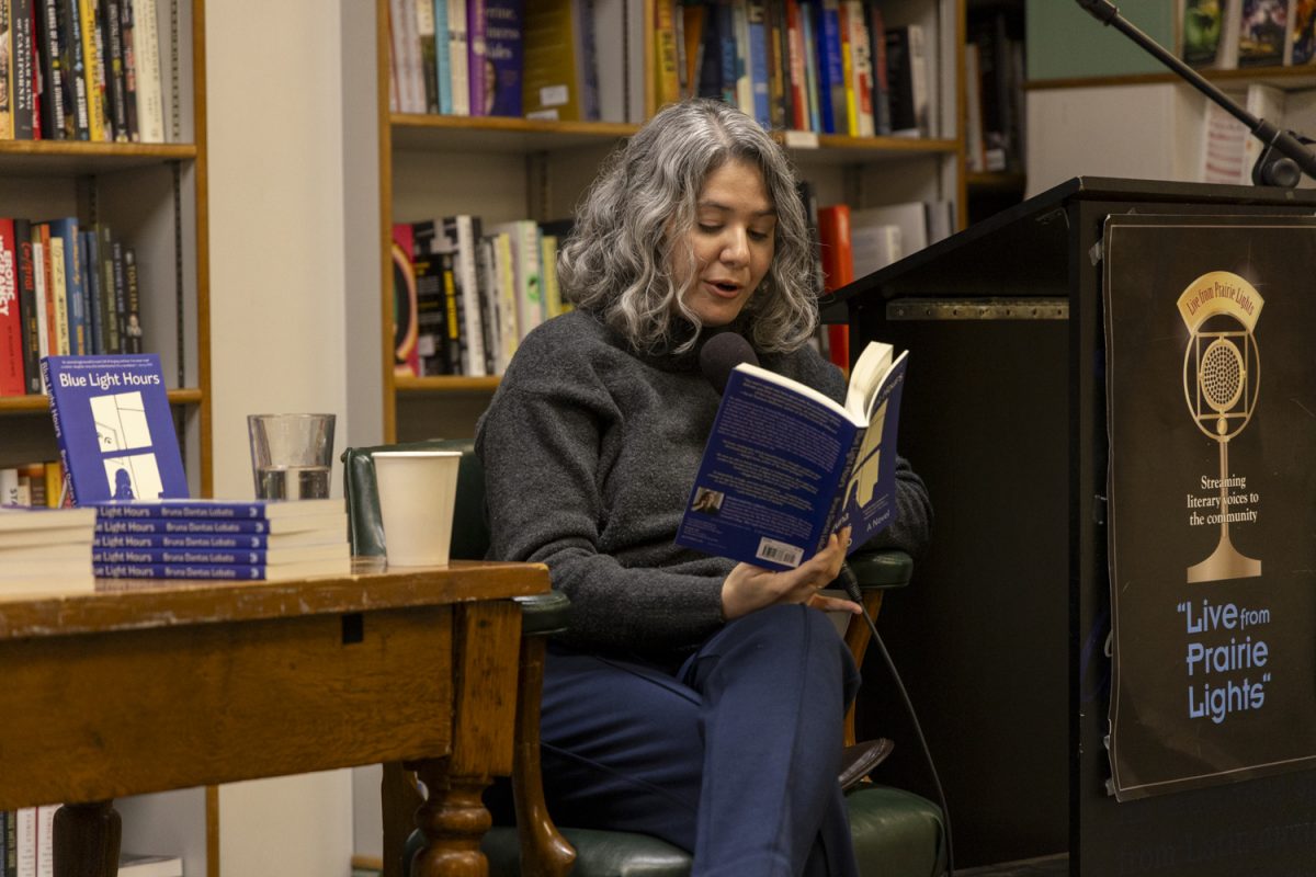 Bruna Dantas Lobato reads from her book, "Blue Light Hours," at Prairie Lights Books and Cafe in Iowa City on Oct. 15. Lobato was also awarded the 2023 National Book Award for Translation. 