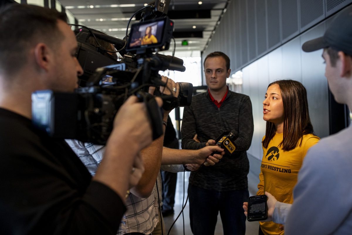 Iowa 138-pound Lilly Luft answers questions during the second annual Iowa women’s wrestling media day at the Goschke Family Wrestling Training Center in Iowa City, on Oct. 15, 2024.
