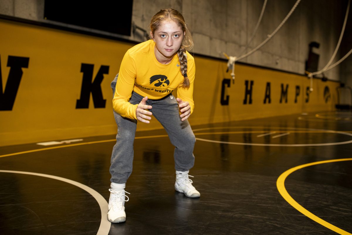 Iowa 110-pound Ava Bayless poses for a portrait during the second annual Iowa women’s wrestling media day at the Goschke Family Wrestling Training Center in Iowa City, on Oct. 15, 2024.