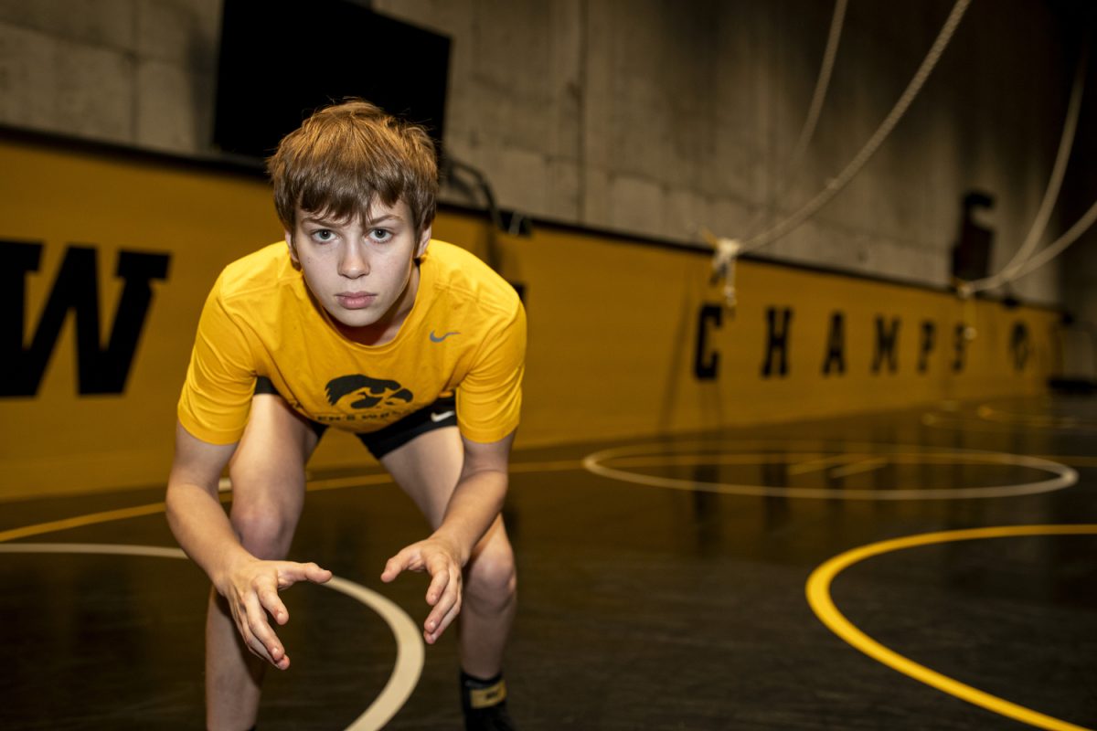 Iowa 117-pound Ava Rose poses for a portrait during the second annual Iowa women’s wrestling media day at the Goschke Family Wrestling Training Center in Iowa City, on Oct. 15, 2024.