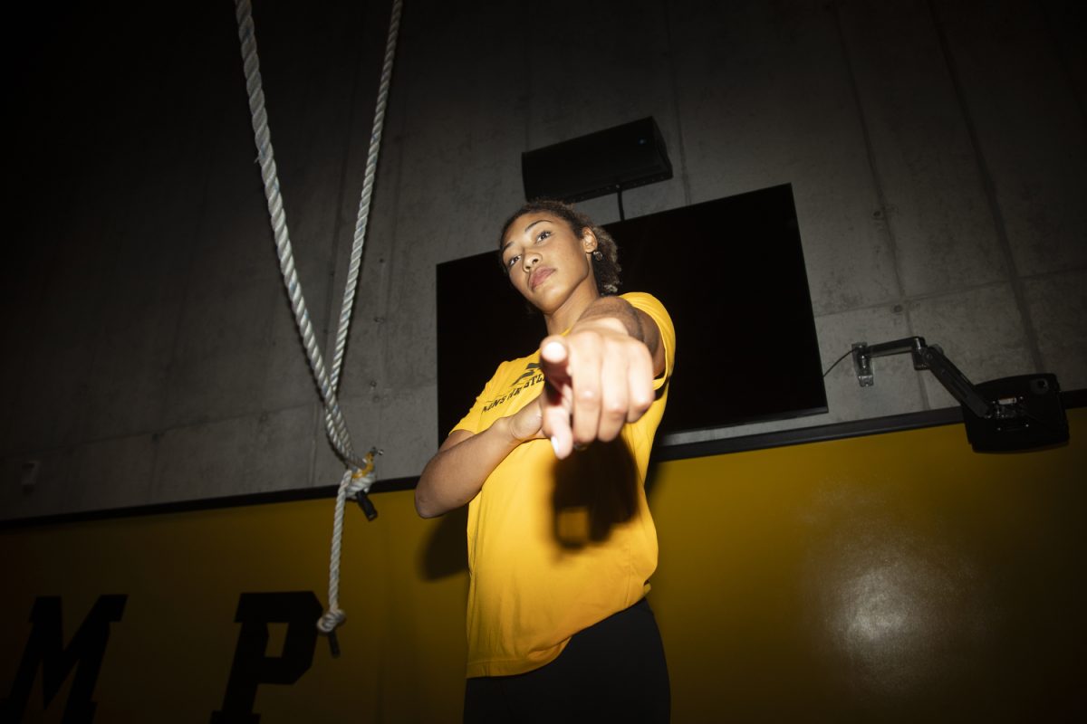 Iowa 160-pound Kennedy Blades poses for a portrait during Iowa Women’s Wrestling media day at the Gosche Family Wrestling Facility in Iowa City on Tuesday, Oct. 15, 2024.  The team took questions and photos with the media.