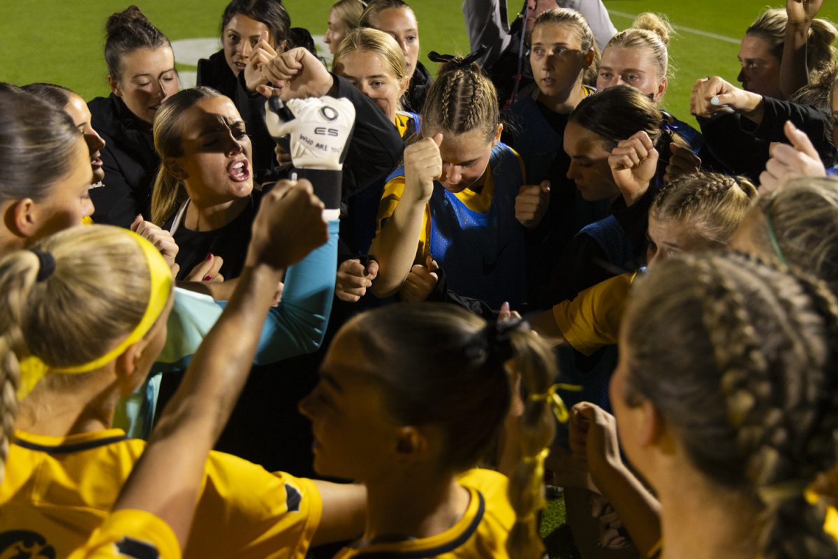 Iowa players break down a huddle before a women’s soccer game between Iowa and Washington at the University of Iowa Soccer Complex on Thursday, Oct. 17, 2024. The Hawkeyes defeated the Huskies 1-0.