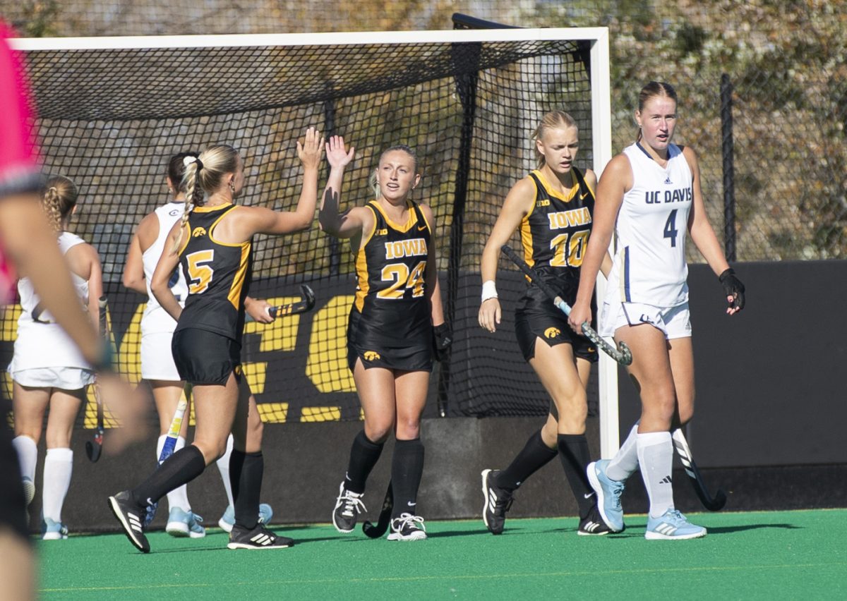 The Iowa women’s field hockey team celebrates after a goal during a game between the no. 17 Iowa Hawkeyes and the UC Davis Aggie at Grant Field in Iowa City on Friday, Oct. 18, 2024. The Hawkeyes defeated the Aggies, 5-0.