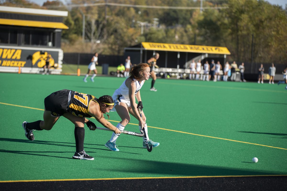 Iowa middle fielder Jacey Wittel hits the ball during a game between the No. 17 Iowa and UC Davis at Grant Field in Iowa City on Oct. 18. The Hawkeyes defeated the Aggies, 5-0.