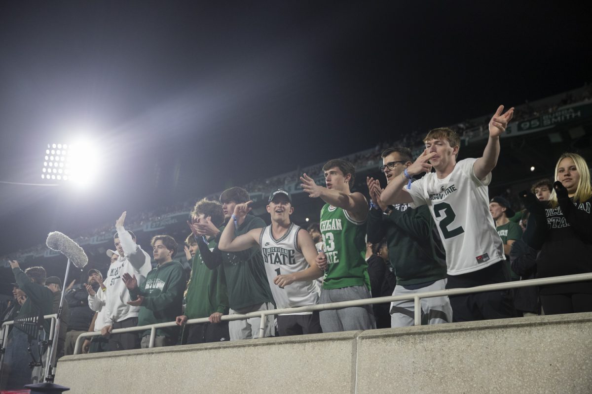 Michigan State fans react after a touchdown during a game between the Iowa and Michigan State at Spartan Stadium in East Lansing, Mich., on Saturday, Oct. 19, 2024. The Spartans defeated the Hawkeyes, 32-20.