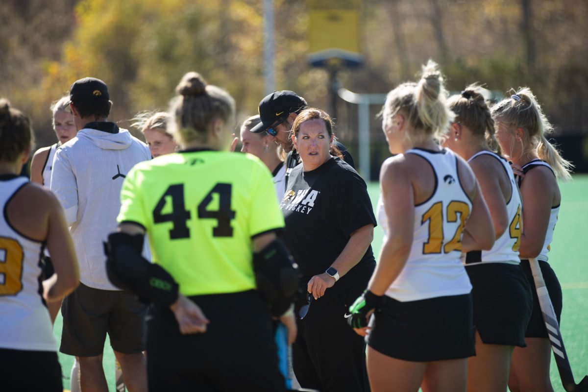 Iowa head coach Lisa Cellucci calls in the Iowa team during a field hockey game between No. 17 Iowa and No. 18 California at Grant Field in Iowa City on Sunday, Oct. 20, 2024. The Hawkeyes defeated the Golden Bears, 3-1.