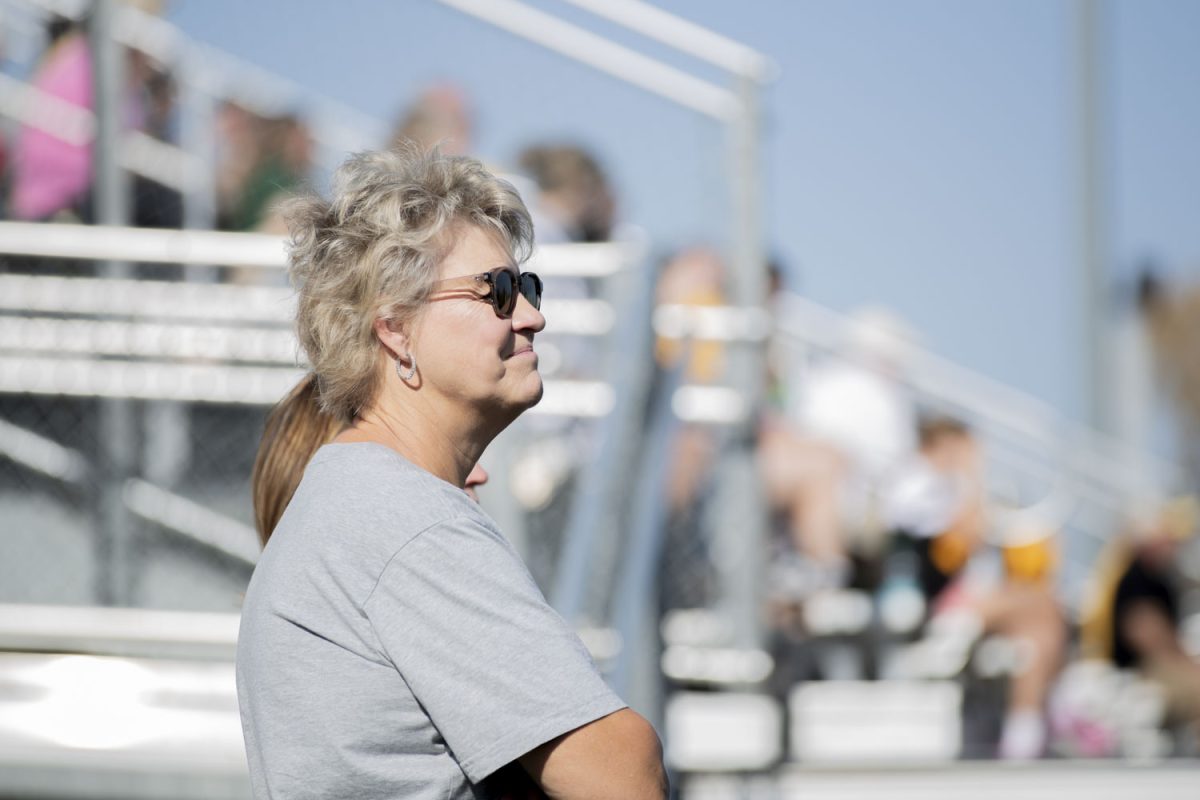 Former head coach of the Iowa women’s basketball team Lisa Bluder watches from the sidelines during a field hockey game between No. 17 Iowa and No. 18 California at Grant Field in Iowa City on Sunday, Oct. 20, 2024. The Hawkeyes defeated the Golden Bears, 3-1.